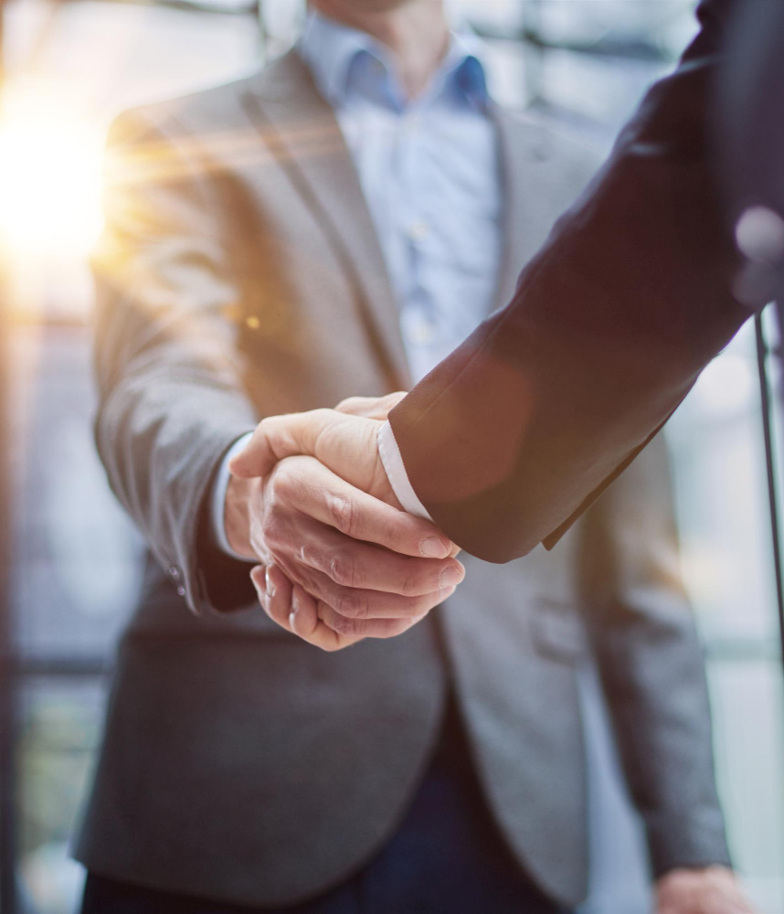 Better Benefits Group - two men shaking hands indicating their partnership.