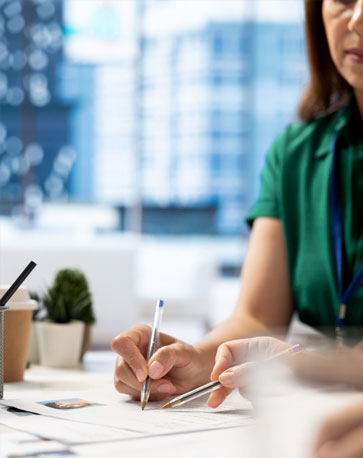 HR & Payroll Support - woman working on filling out forms